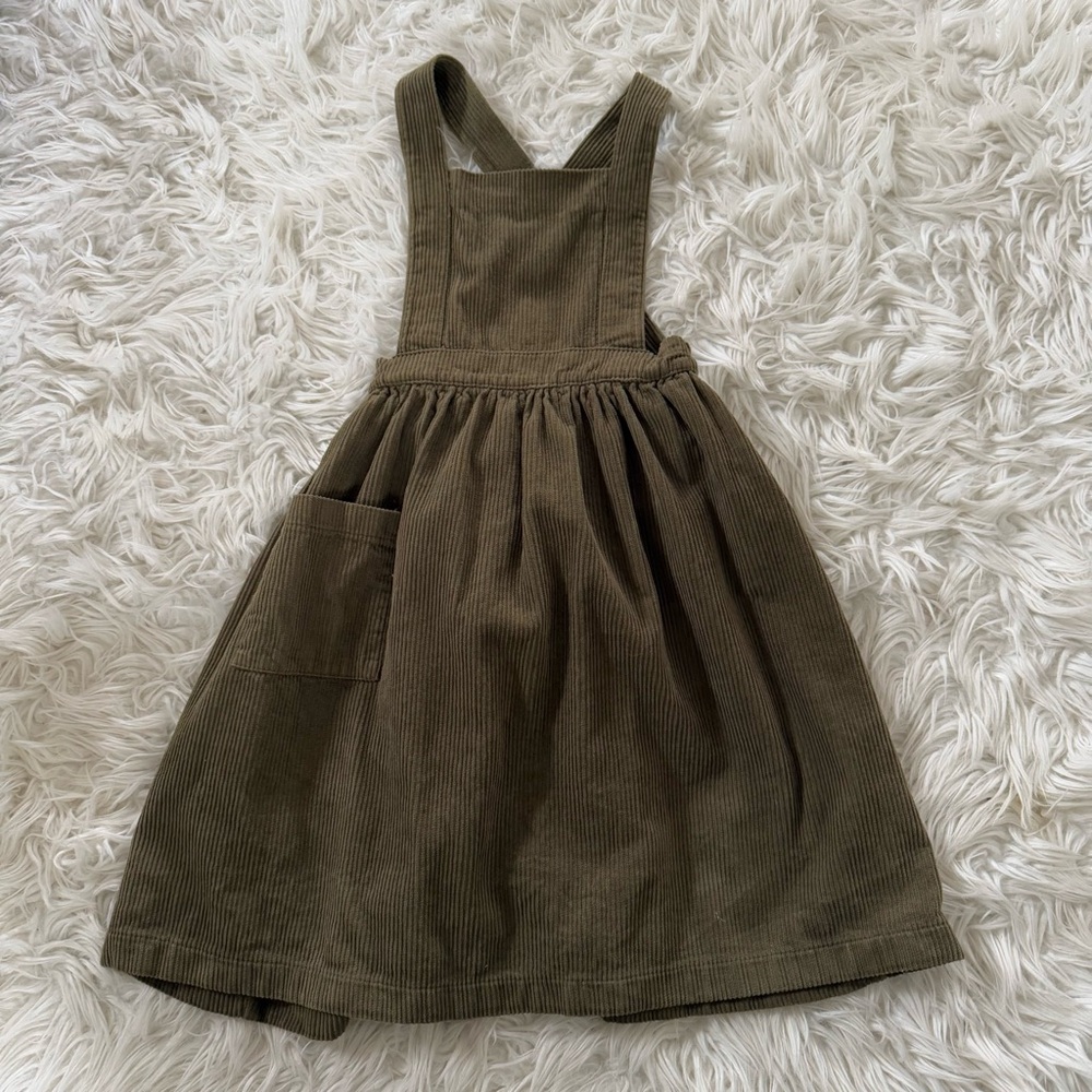 The Simple Folk corduroy pinafore dress in Olive